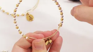 How to Add Beads and a Charm to an Expandable Charm Bangle made using the Artistic Wire 3D Bracelet Jig